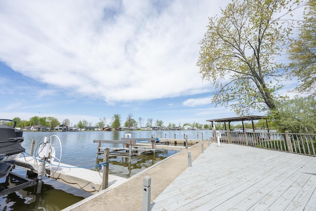 view of dock with a water view and boat lift