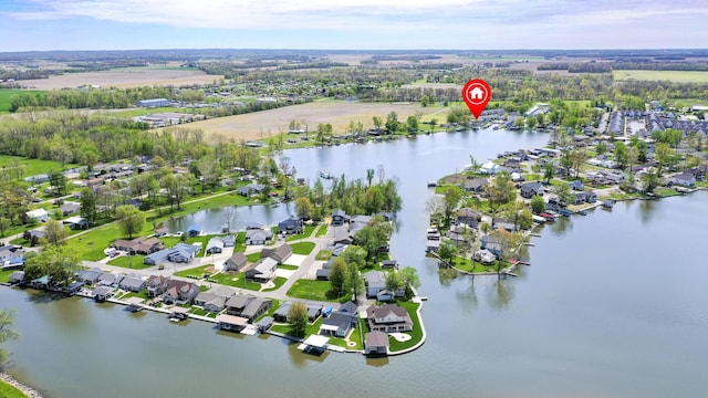 birds eye view of property featuring a residential view and a water view