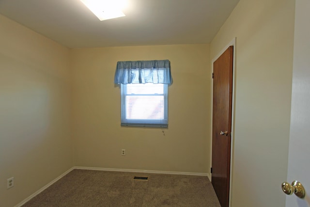 view of carpeted spare room