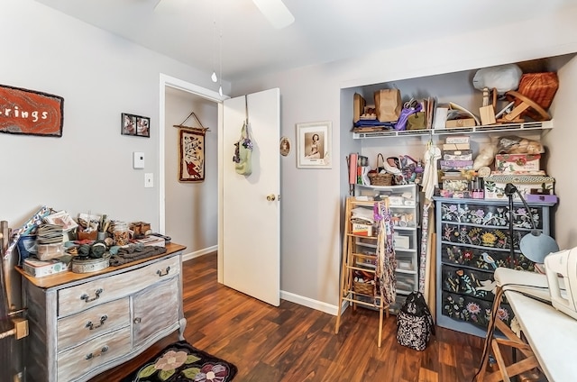 interior space with dark wood finished floors and baseboards