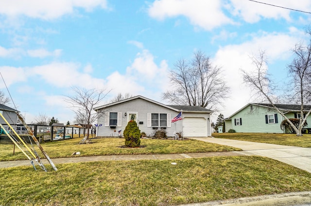 view of front of house with a garage, concrete driveway, and a front yard