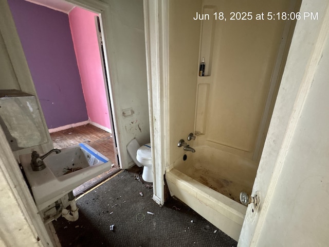 542 N Main St, Ada, OH 45810 - bathroom with toilet and shower / tub combination