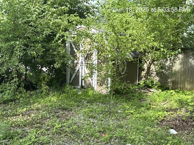 542 N Main St, Ada, OH 45810 - view of yard with a storage unit
