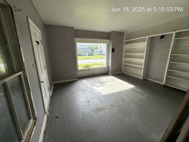 542 N Main St, Ada, OH 45810 - unfurnished bedroom featuring baseboards