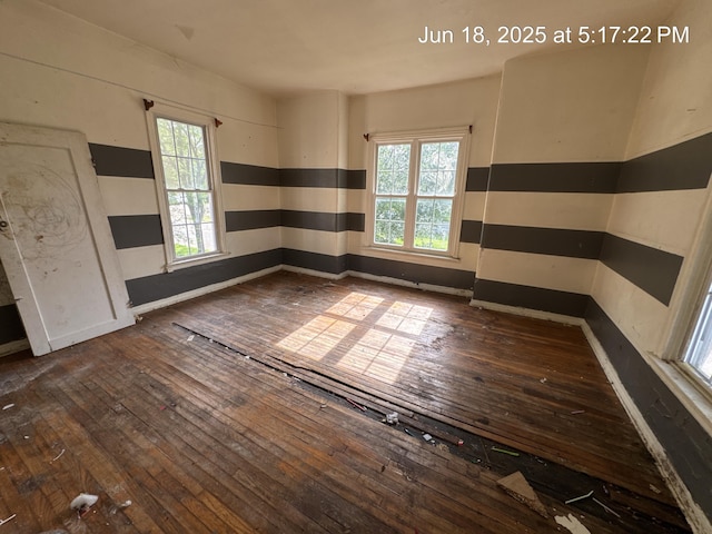 542 N Main St, Ada, OH 45810 - unfurnished room with hardwood / wood-style flooring
