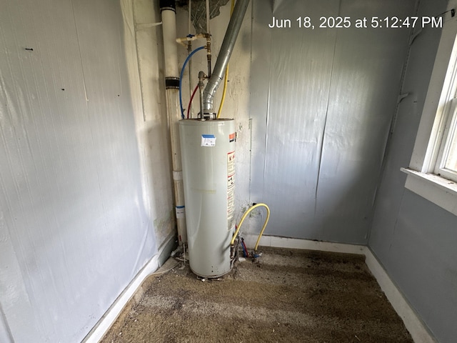 542 N Main St, Ada, OH 45810 - utility room with water heater