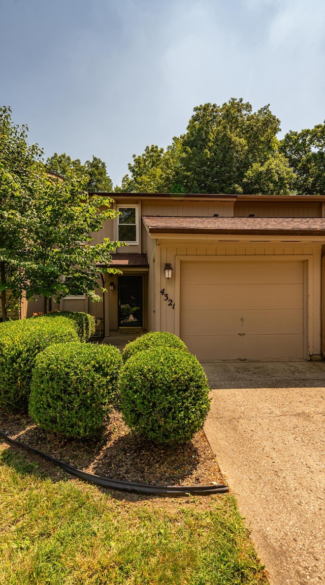 4321 Frontenac Dr, Beavercreek, OH 45440 - view of front of home featuring driveway and a garage