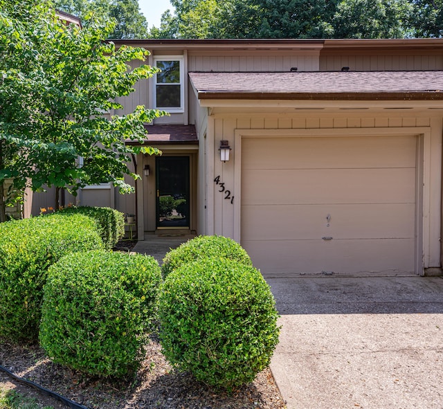 4321 Frontenac Dr, Beavercreek, OH 45440 - view of property featuring concrete driveway and an attached garage