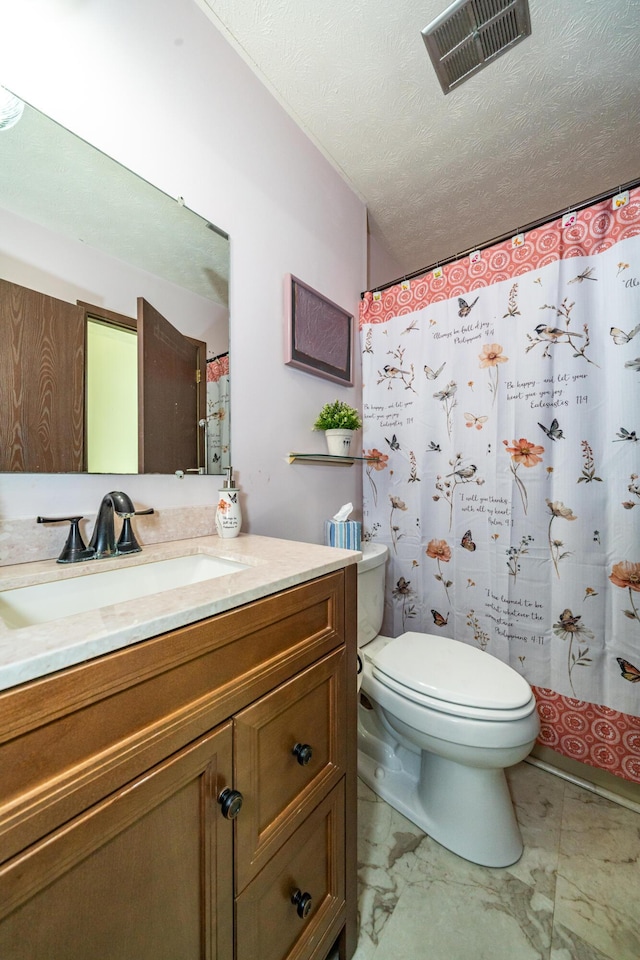 4321 Frontenac Dr, Beavercreek, OH 45440 - bathroom featuring vanity, a textured ceiling, marble finish flooring, and a shower with curtain