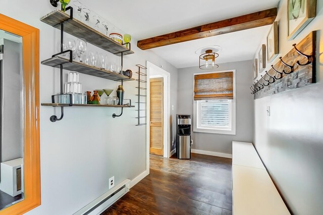 7748 Walnut St, Russells Point, OH 43348 - interior space with beamed ceiling, baseboards, baseboard heating, and dark wood-style flooring