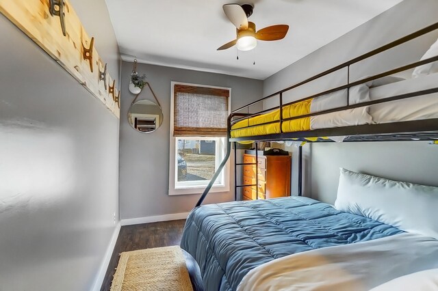 7748 Walnut St, Russells Point, OH 43348 - bedroom with a ceiling fan, wood finished floors, and baseboards