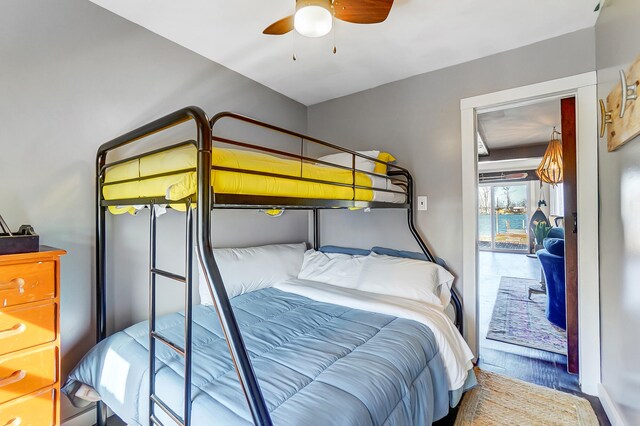 7748 Walnut St, Russells Point, OH 43348 - bedroom featuring ceiling fan and wood finished floors