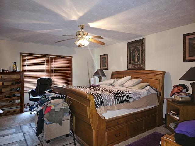 1308 Stonyridge Ave, Troy, OH 45373 - bedroom featuring carpet flooring, ceiling fan, a desk, and a textured ceiling