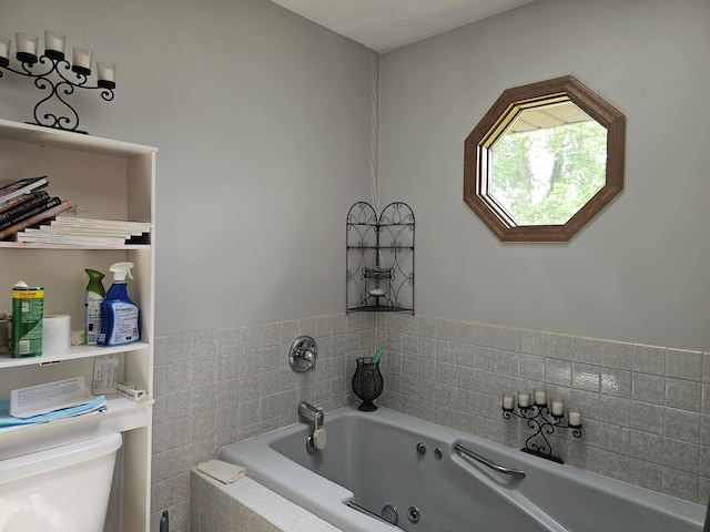 1308 Stonyridge Ave, Troy, OH 45373 - bathroom with a tub with jets and toilet
