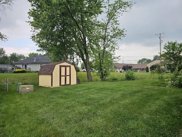 1308 Stonyridge Ave, Troy, OH 45373 - view of grassy yard featuring a storage unit