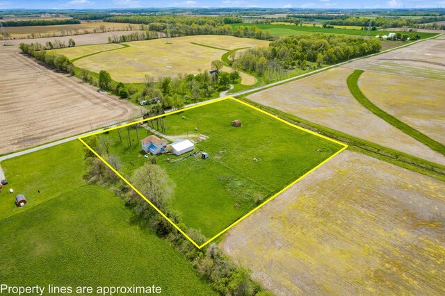 aerial view of sparsely populated area featuring property boundaries highlighted