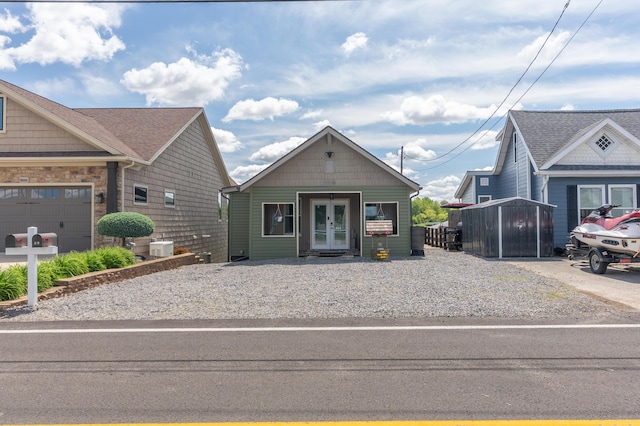 8886 State Route 368, Huntsville, OH 43324 - view of front of home with french doors and cooling unit