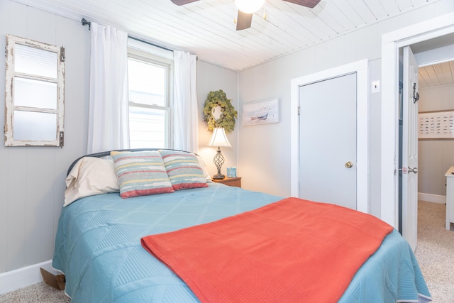 8886 State Route 368, Huntsville, OH 43324 - bedroom with baseboards, carpet floors, and a ceiling fan