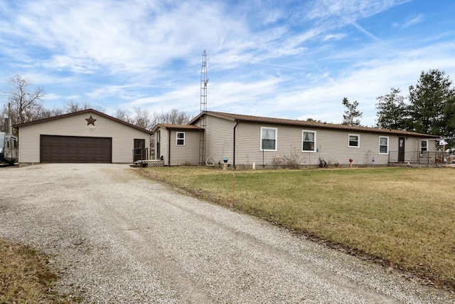 view of front of home with an outdoor structure and a front lawn