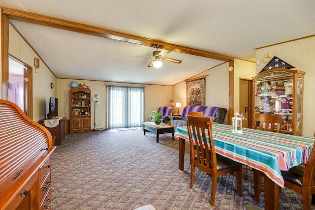 dining space featuring crown molding, carpet flooring, vaulted ceiling with beams, and ceiling fan