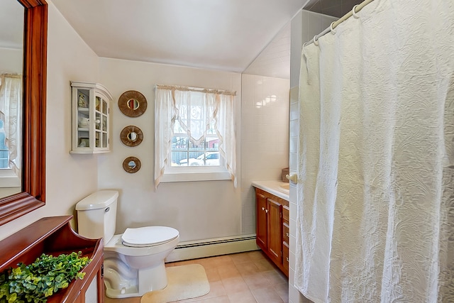 bathroom featuring vanity, toilet, and a baseboard heating unit