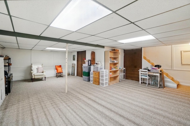 2357 London Dr, Lima, OH 45805 - finished basement featuring carpet, a paneled ceiling, stairway, and baseboards