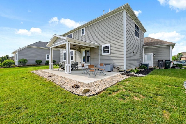 2306 Larkspur Dr, Troy, OH 45373 - rear view of house with a yard and a patio area