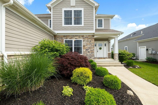 2306 Larkspur Dr, Troy, OH 45373 - view of front of home with stone siding