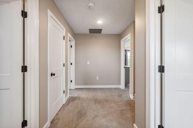 2306 Larkspur Dr, Troy, OH 45373 - hall featuring carpet floors and a textured ceiling