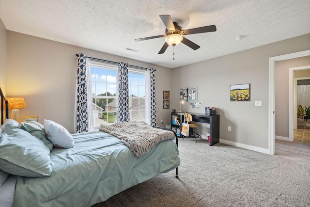 2306 Larkspur Dr, Troy, OH 45373 - carpeted bedroom featuring a textured ceiling and ceiling fan