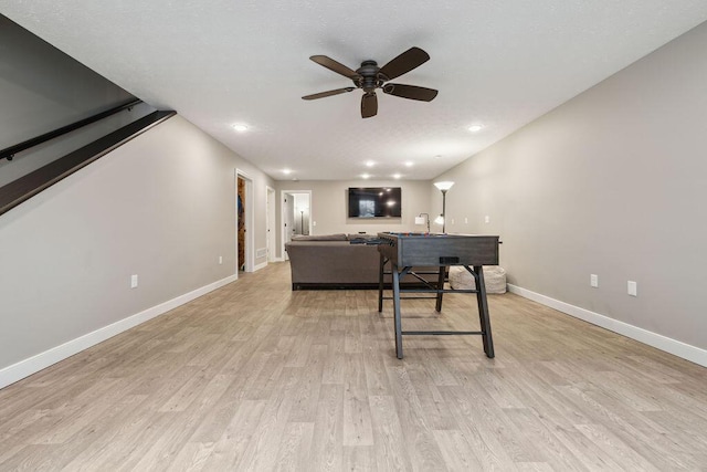 2306 Larkspur Dr, Troy, OH 45373 - living area with a ceiling fan, light wood finished floors, and recessed lighting