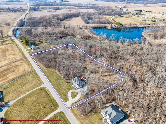 drone / aerial view featuring a water view and a rural view