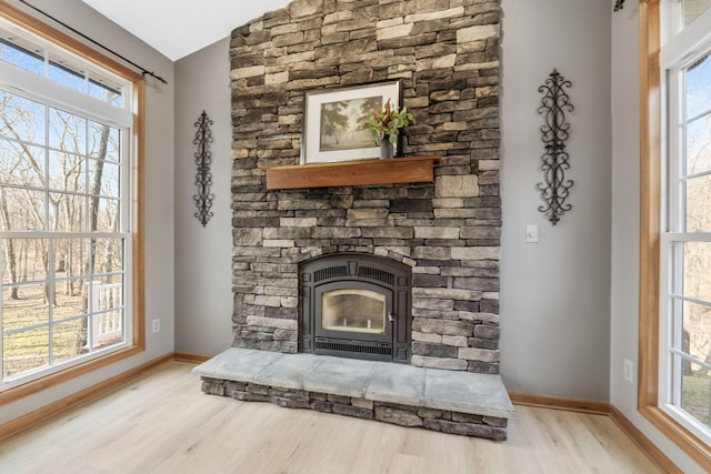 room details with baseboards and wood finished floors