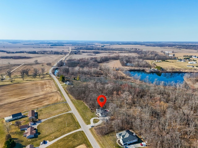 drone / aerial view with a rural view and a water view