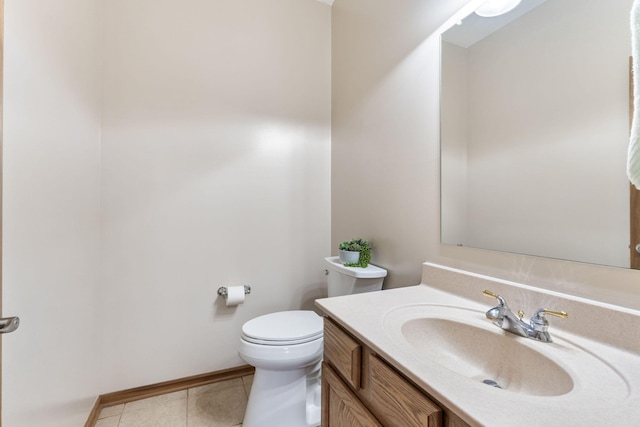 half bath featuring tile patterned flooring, toilet, and vanity