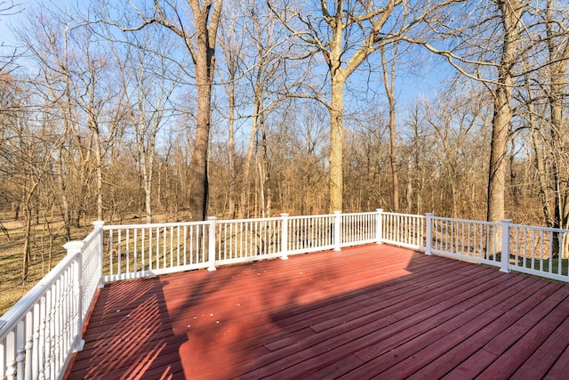 deck with a wooded view