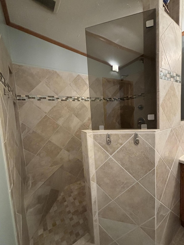 bathroom featuring vanity and walk in shower