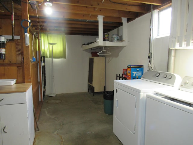 laundry room with washer and dryer