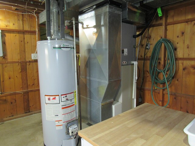 utility room with water heater