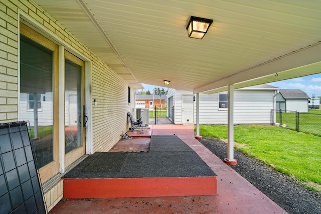 view of patio featuring fence