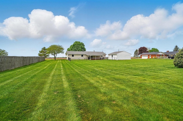 view of yard featuring fence