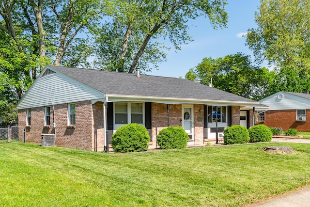 730 Maplecrest Dr, Troy, OH 45373 - view of front of property featuring brick siding, covered porch, and roof with shingles