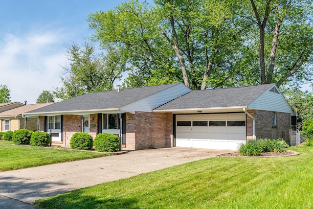 730 Maplecrest Dr, Troy, OH 45373 - ranch-style home featuring brick siding, a garage, concrete driveway, and a shingled roof