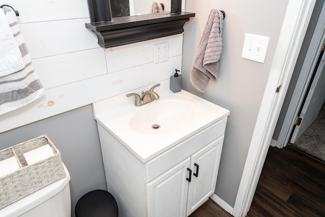 730 Maplecrest Dr, Troy, OH 45373 - bathroom with vanity, wood finished floors, and toilet