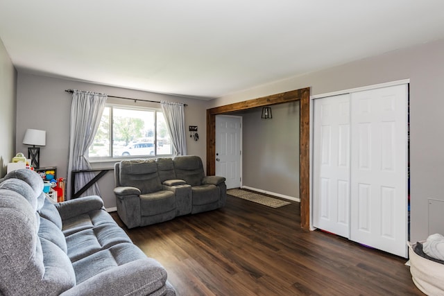 730 Maplecrest Dr, Troy, OH 45373 - living area with dark wood-style floors and baseboards