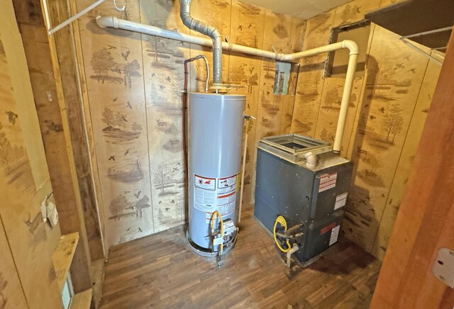 utility room with gas water heater