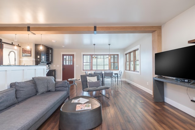 7933 Hickory Ave, Russells Point, OH 43348 - living area with baseboards, dark wood-type flooring, and beam ceiling