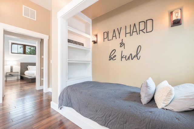 7933 Hickory Ave, Russells Point, OH 43348 - bedroom featuring baseboards and wood finished floors