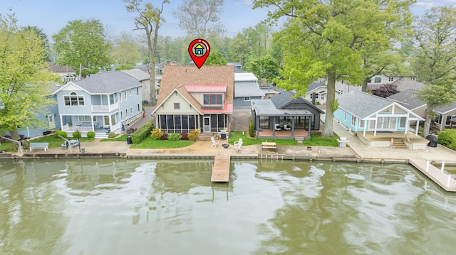 7933 Hickory Ave, Russells Point, OH 43348 - water view featuring nearby suburban area and a boat dock