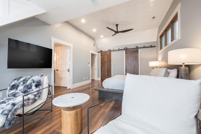 7933 Hickory Ave, Russells Point, OH 43348 - bedroom with recessed lighting, a barn door, wood finished floors, lofted ceiling, and baseboards
